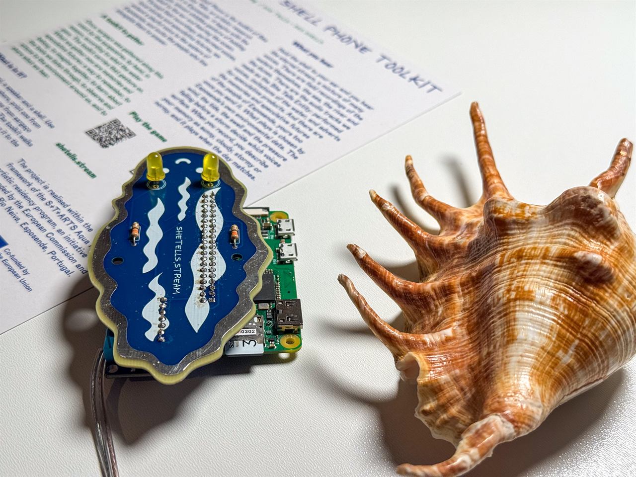 The snail board on the Raspberry Pi, next to the shell